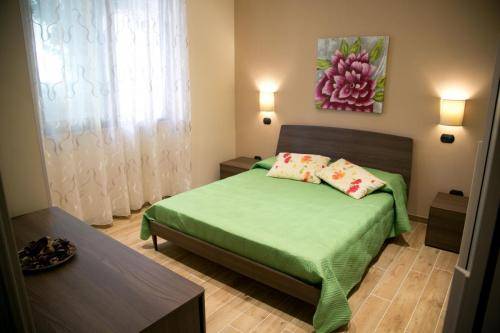 Camera da letto Appartamenti Letojanni Casa Putti marrone